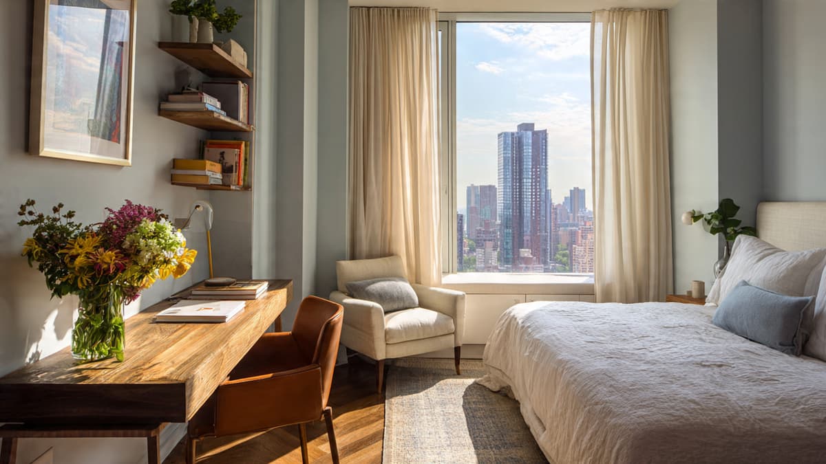 Desk repositioned away from bed with clear separation