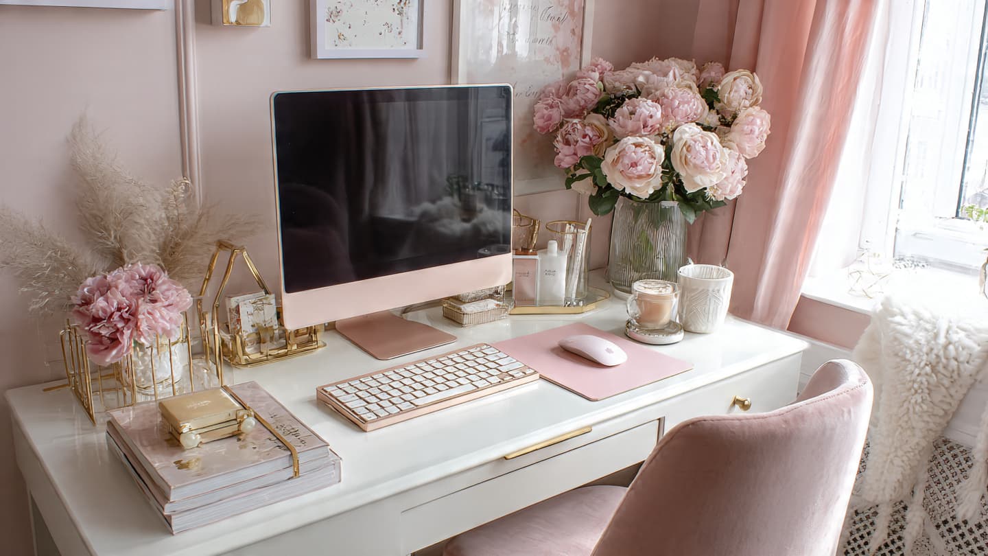 Pastel desk setup with subtle decorative accents